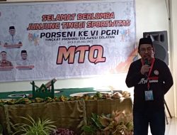 Ketua Panitia Beri Sambutan di Lomba MTQ Porseni PGRI