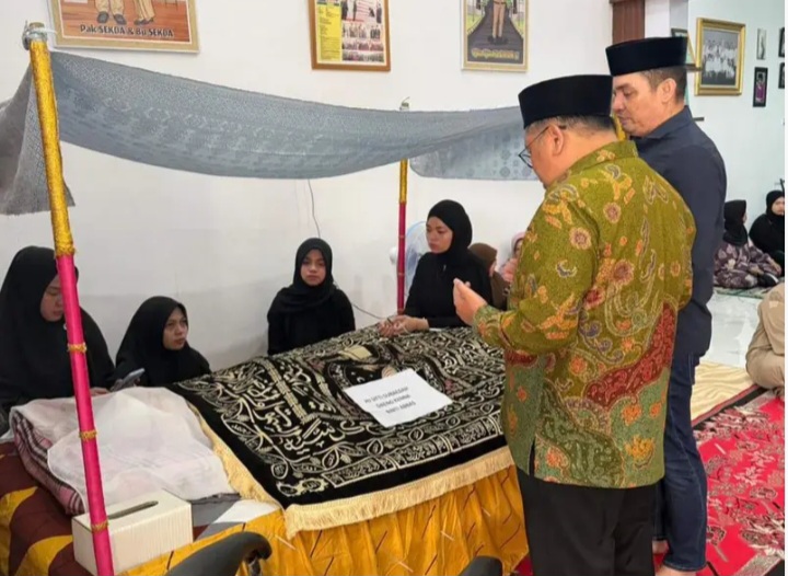 Almarhumah